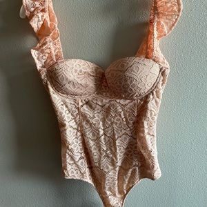 LuLus XS light pink  bodysuit with low back